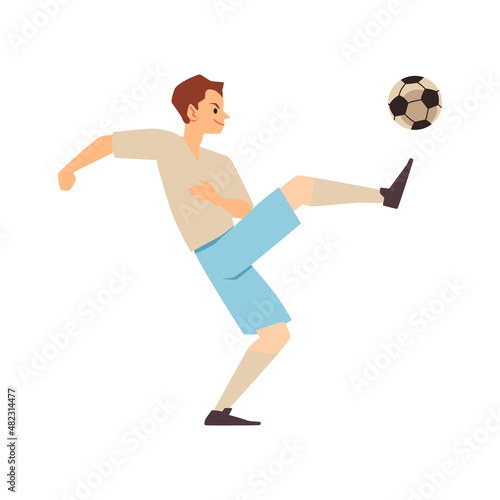 White soccer player kick the ball high up, side view. Smirking male character play football in training clothes.