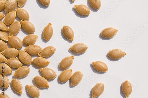 close up Sweet pumpkin seeds isolated white background.