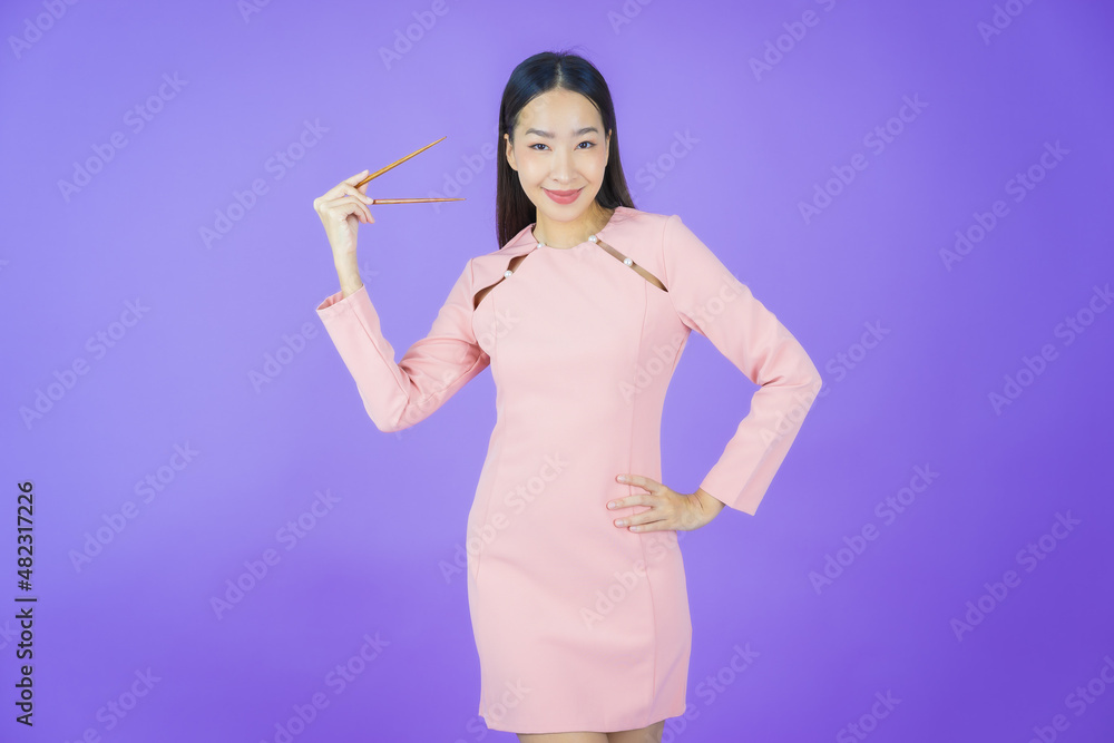 Portrait beautiful young asian woman with chopsticks Portrait beautiful young asian woman with chopsticks