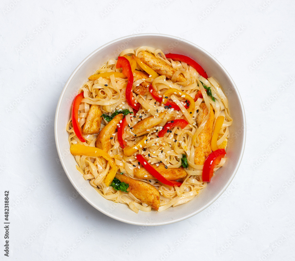 Udon noodles with chicken, pepper and sesame. Chinese food. Udon noodles with chicken, pepper and sesame. Chinese food.