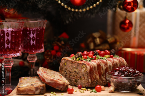 Traditional French terrine covered with bacon and decorated Christmas tree