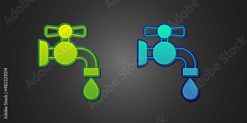 Green and blue Water tap icon isolated on black background. Vector