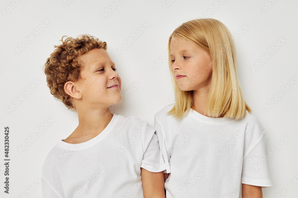 Boy and girl Friendship posing together childhood unaltered Boy and girl Friendship posing together childhood unaltered