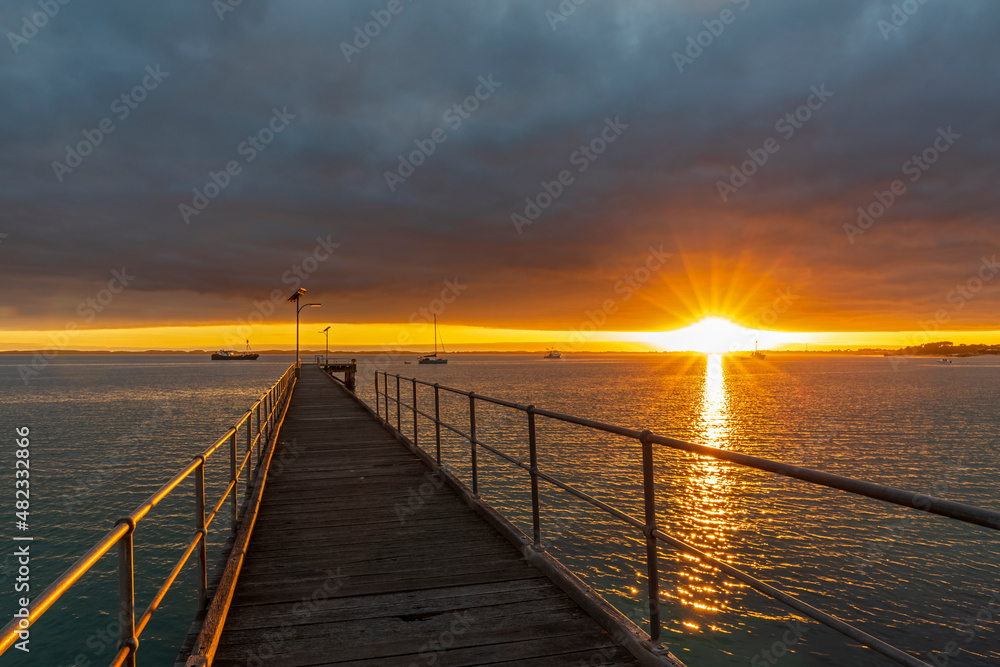 Australia,South Australia, Robe, Robe Jetty at cloudy sunset Australia,South Australia, Robe, Robe Jetty at cloudy sunset