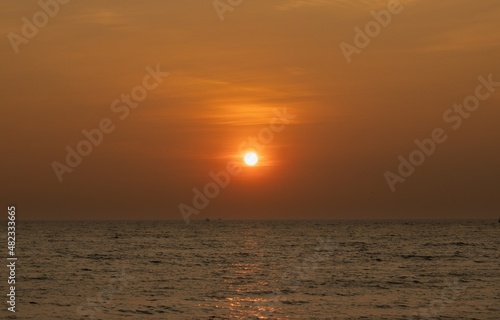 sunset on the beach © Plato