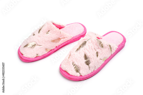 Women's room slippers with faux fur and pink soles.