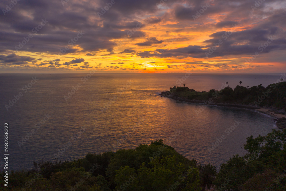 panorama sunset above Promthep cape is a mountain of rock that extends into the sea in Phuket Thailand..Promthep cape is the most popular viewpoint in Phuket. beautiful nature at sunset .