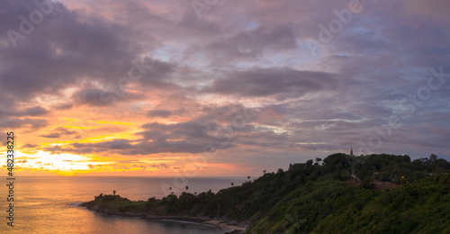 panorama sunset above Promthep cape is a mountain of rock that extends into the sea in Phuket Thailand..Promthep cape is the most popular viewpoint in Phuket. beautiful nature at sunset .