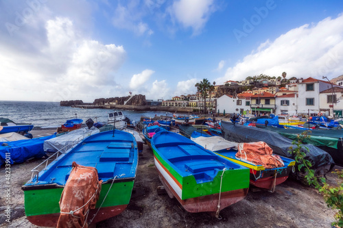 Boats moored at harbor in Camara De Lobos, Funchal, Madeira, Portugal photo