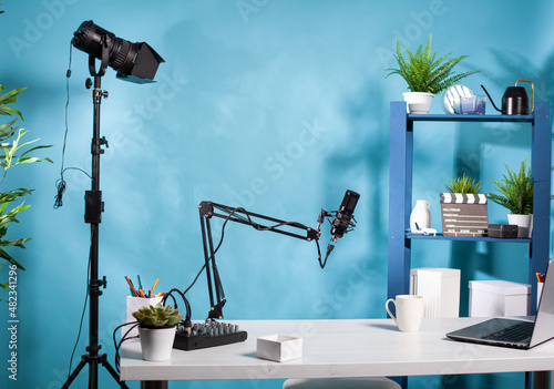 Φωτογραφία Professional video light stand in empty vlog broadcasting studio with microphone used for recording social media content