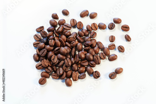 Close view of roasted coffee beans ready to be ground and infused