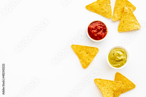 Snack for party corn nachos with salsa and guacamole sauces