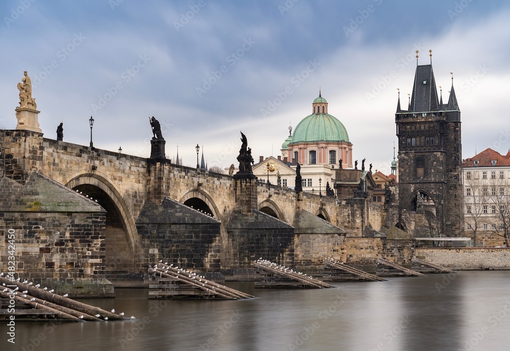 Charles bridge in Prague, Czechia. Architecture and landmark of Prague. Long exposure.