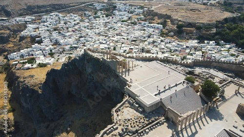 Lindos small whitewashed village and the Acropolis, scenery of Rhodos Island at Aegean Sea