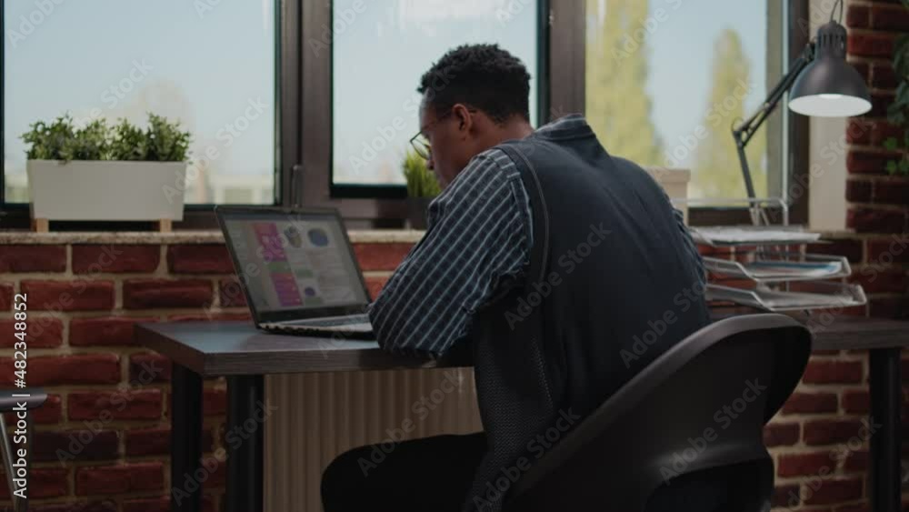 Financial consultant analyzing sales development on laptop to plan commercial innovation with e commerce and e shopping. Manager using statistics report to do startup investment. Financial consultant analyzing sales development on laptop to plan commercial innovation with e commerce and e shopping. Manager using statistics report to do startup investment.