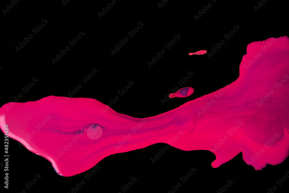Neon Pink and purple paint on black Neon Pink and purple paint on black