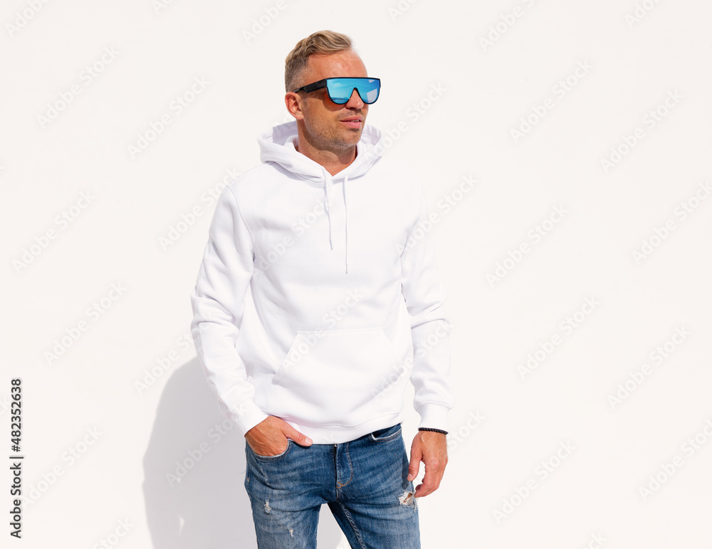 Man wearing blank white hoody, mockup for men hoodie sweatshirt design Man wearing blank white hoody, mockup for men hoodie sweatshirt design