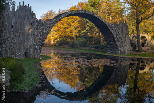 Bridge in rhododendron park in Kromlau in a beautiful autumn mood © Mike Mareen
