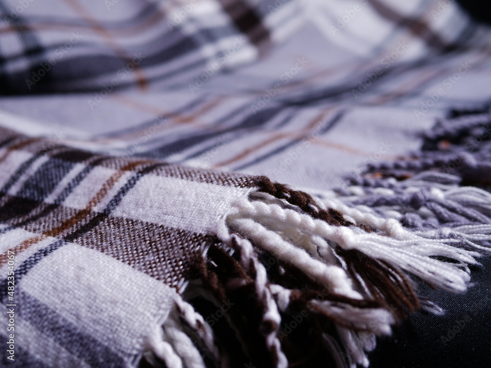 Warm blanket fleece throw with tassels close up shot