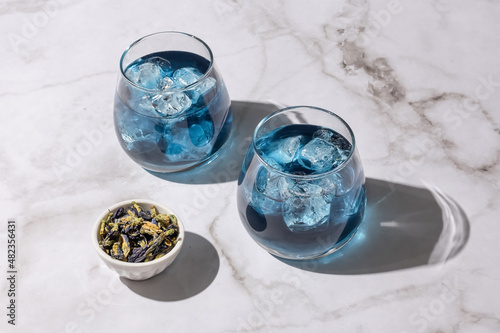 Iced blue tea, two glasses of anchan from butterfly pea flower.