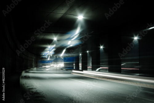 Dark tunnel with light trails. Motion blur image of a dark tunnel. © Azazello