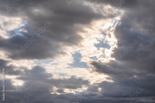 blue sky with dark clouds