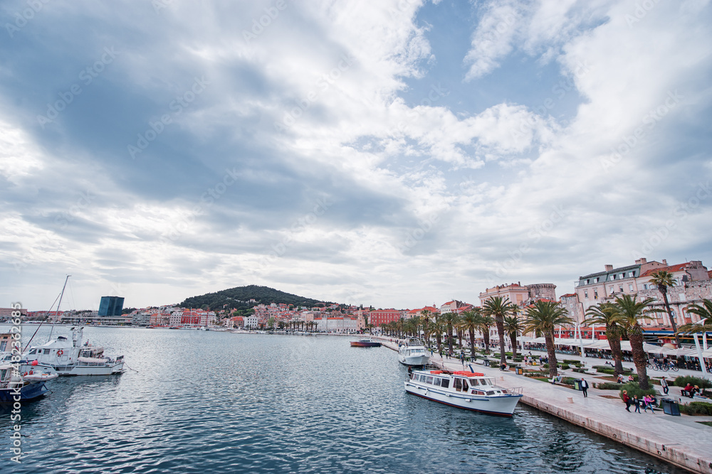 Travel by Croatia. Beautiful landscape with Split Old Town and sea promenade.