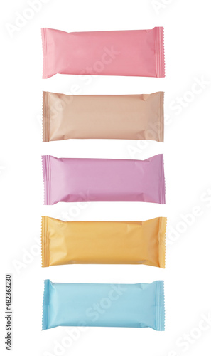 Chocolate bars in different pastel colors wrappers isolated. Mock-up.