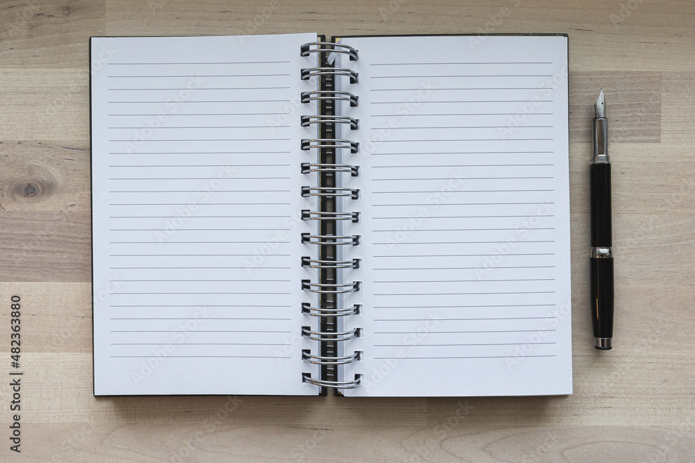 open notebook and pen open notebook and pen