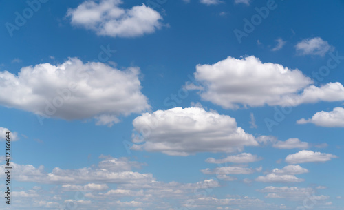 White clouds on the blue sky bankground