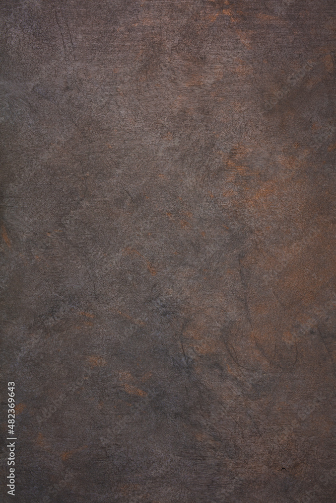 Dark Iron cast iron sheet with patina and rust. The texture of the copper  and bronze metal background . Metallic texture. Stock Photo