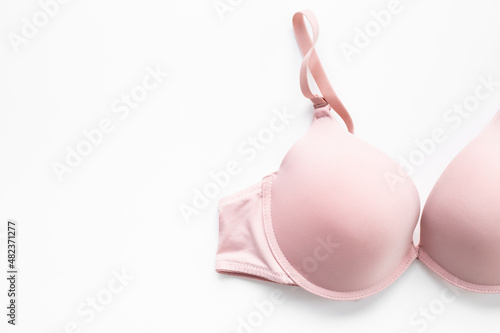 Pink bra top view - breast cancer diagnosis concept