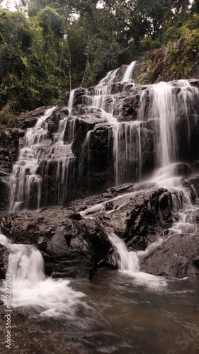 Long exposure Sa Lad Dai Waterfall located in Ban Na District, Nakhon Nayok, Thailand.