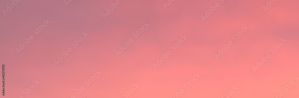 Blue sky at sunset. Orange and pink landscape