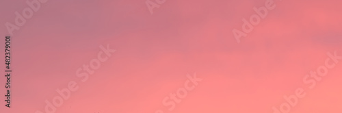 Blue sky at sunset. Orange and pink landscape