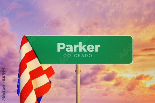 Parker - Colorado/USA. Road or City Sign. Flag of the united states. Sunset Sky.