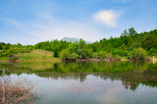 Amazing mountain lake view with reflection on the tranquil water in the national park Rtanj, Serbia 