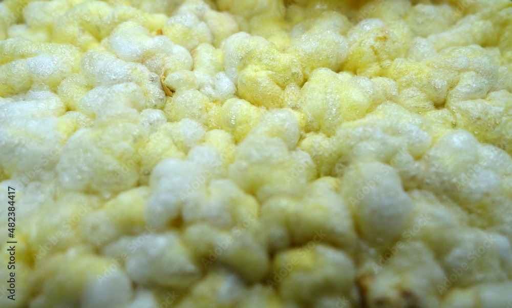 Natural corn cake texture close up.