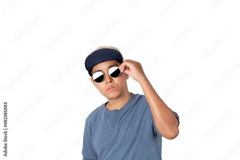 Portrait of asian man wearing sunglasses and blue t-shirt with a cap isolated on white background. Portrait of asian man wearing sunglasses and blue t-shirt with a cap isolated on white background.