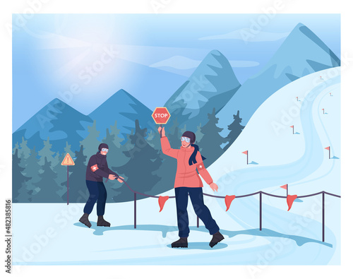 Female and male ski resort rescuers closing up a skiing or snowboarding