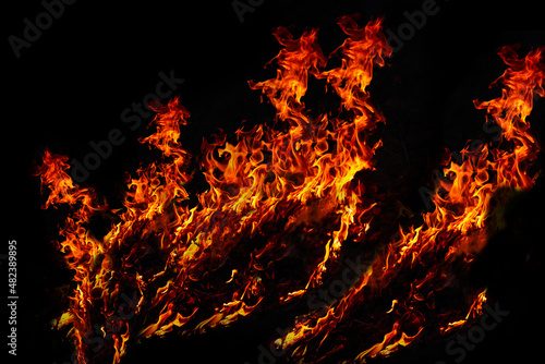 The flames raged on the cracked ground.It represents drought and natural disasters.thirst and hunger concept.