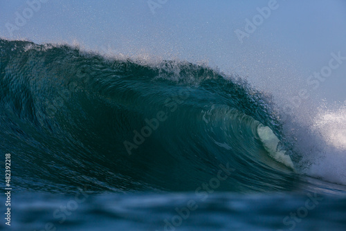 Fototapeta Naklejka Na Ścianę i Meble -  huge surfing wave breaking on a shallow reef