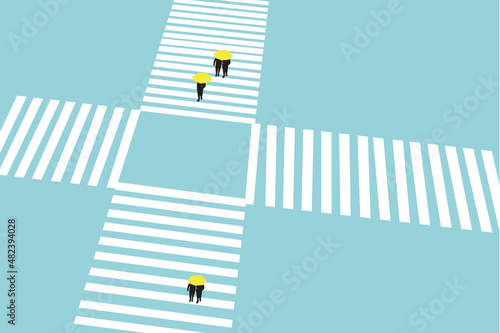 HIGH ANGLE VIEW OF PEOPLE CROSSING THE STREET