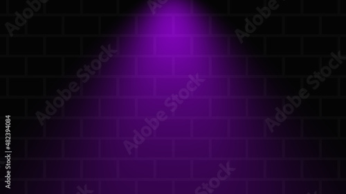 Empty brick wall with purple neon spotlight with copy space. Lighting effect purple color glow on brick wall background. Royalty high-quality free stock photo of lights blank background for texture