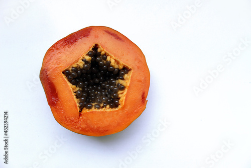 Ripe Papaya Orange Color Cross Section with Black Seeds