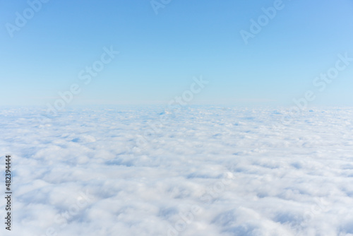 Background with the clouds view of the airplane window