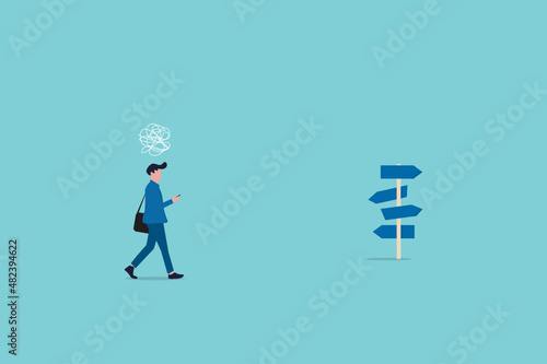 Business decision making, career path, work direction or choose the right way to success concept, confusing businessman looking at multiple road sign with question mark and thinking which way to go.