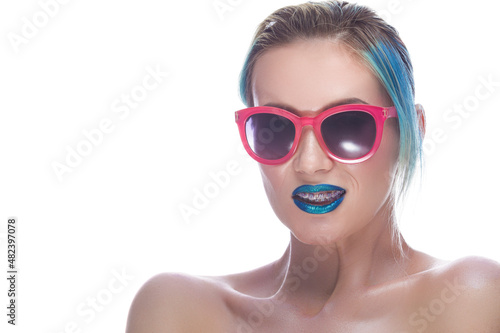 Beauty Portrait of Fancy Caucasian Female with Silky Skin and Teeth Brackets Wearing Red Sunglasses As Dental Healthcare Ideas