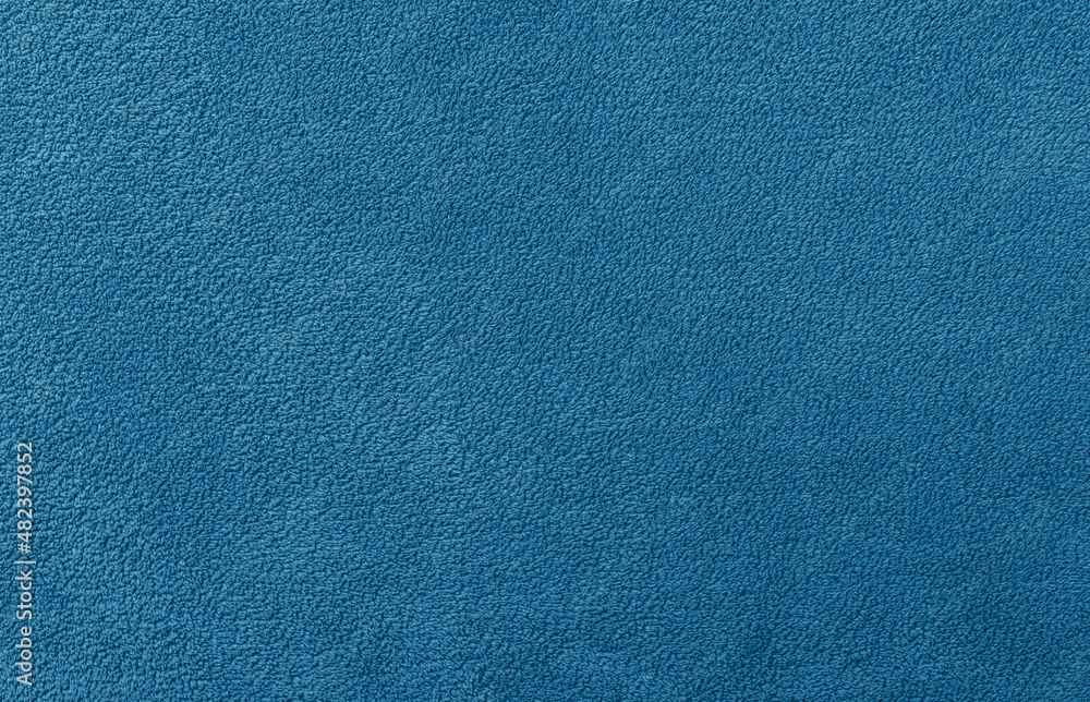 The texture of a beautiful plain fleece fabric. The structure is clearly visible. The texture of a beautiful plain fleece fabric. The structure is clearly visible.