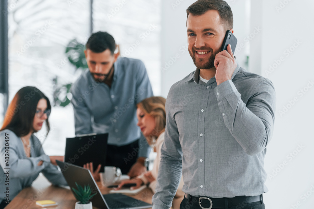 Conception of success. Group of business people that working on the project in the office